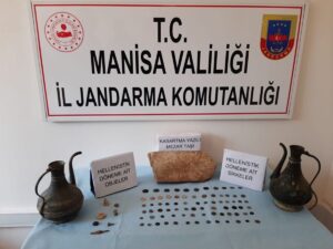 MANİSA (AA) – Manisa'nın Saruhanlı ilçesinde 77 sikke ile tarihi