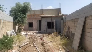 ŞANLIURFA (AA) – Şanlıurfa'nın Ceylanpınar ilçesinde tadilat yapılan evin bahçesinde