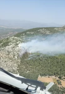 MUĞLA (AA) – Muğla'nın Milas ilçesinde çıkan orman yangınına, havadan