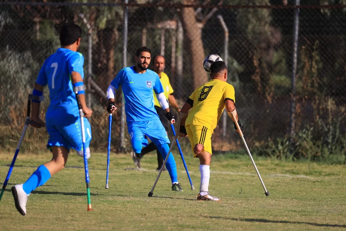 Irak'taki şiddet olaylarında uzuvlarını kaybedenler futbolla hayata tutunuyor