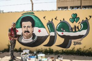 İDLİB (AA) – Suriye'nin kuzeybatısındaki İdlib'de grafiti sanatçısı Aziz Esmer