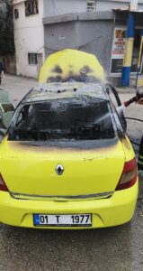 ADANA (AA) – Adana'da bir taksi, kimliği belirsiz kişi tarafından