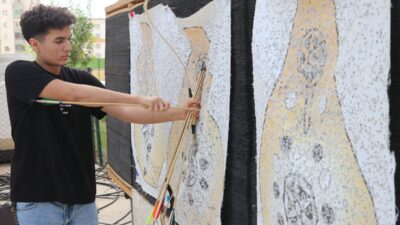 - Geleneksel okçuluğun 14-17 yaş karma 50 libre kategorisinde 421,87